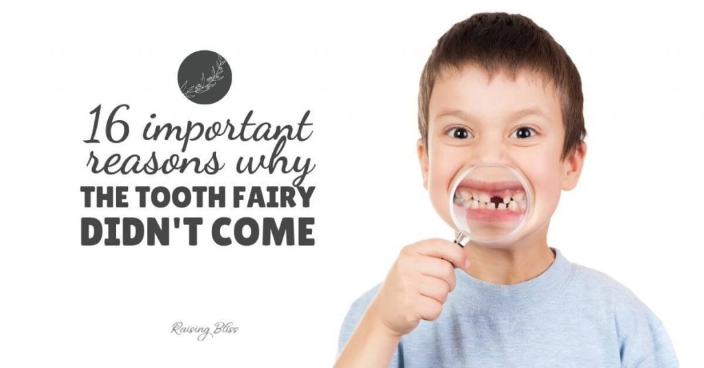 Little boy showing missing tooth via magnifying glass