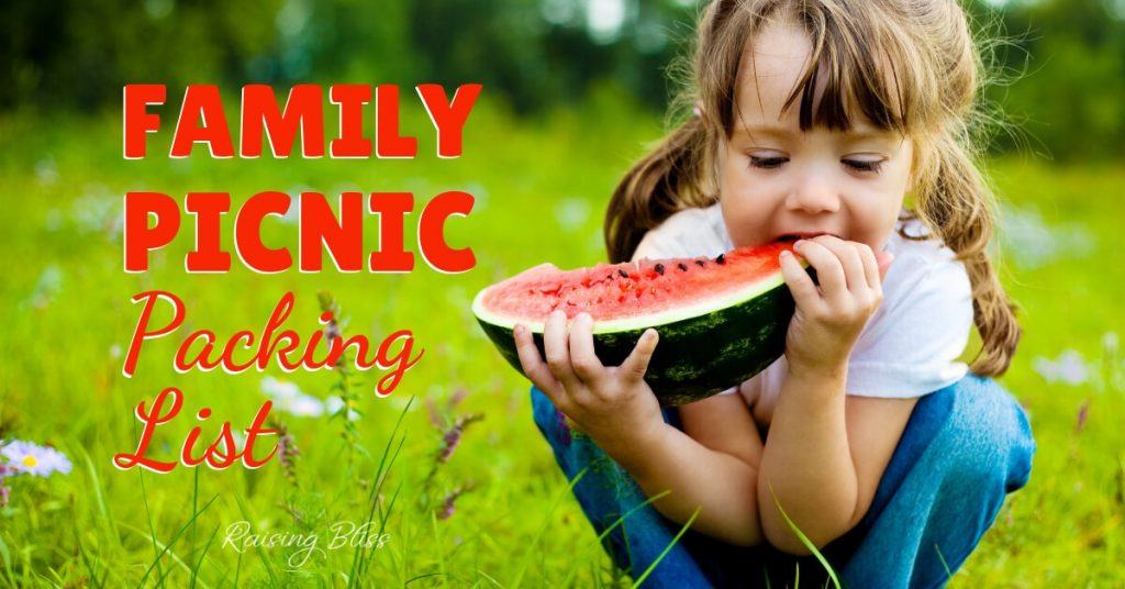 Girl eating watermelon outdoors Family Picnic Packing List by Raising Bliss