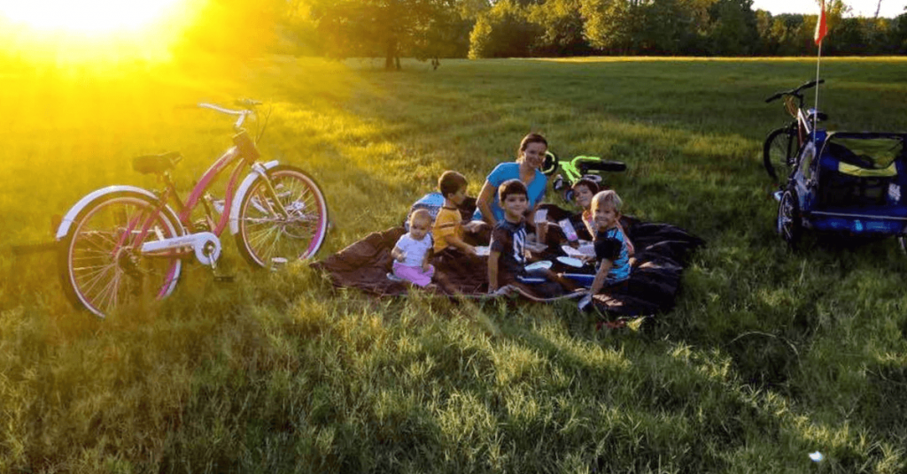 Raising Bliss family on a picnic with bicycles