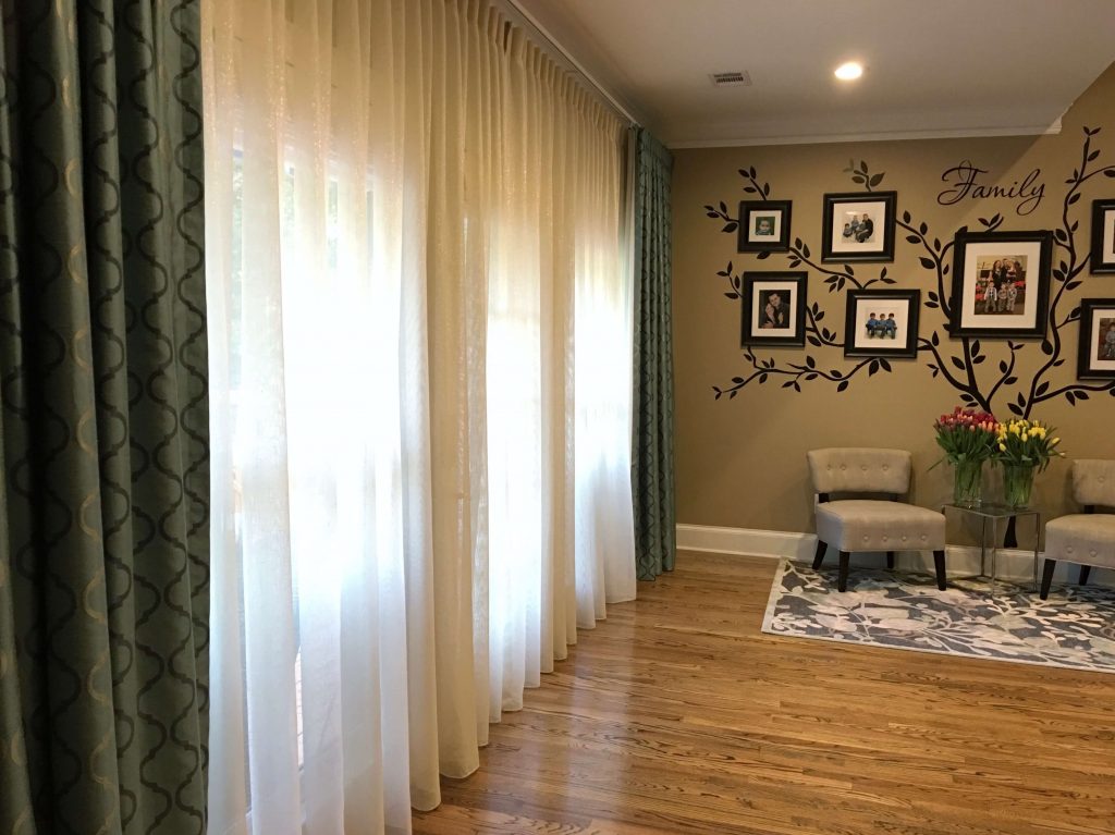 Wall of windows next to a family tree wall - How to make a family tree wall in 5 easy steps by raising bliss